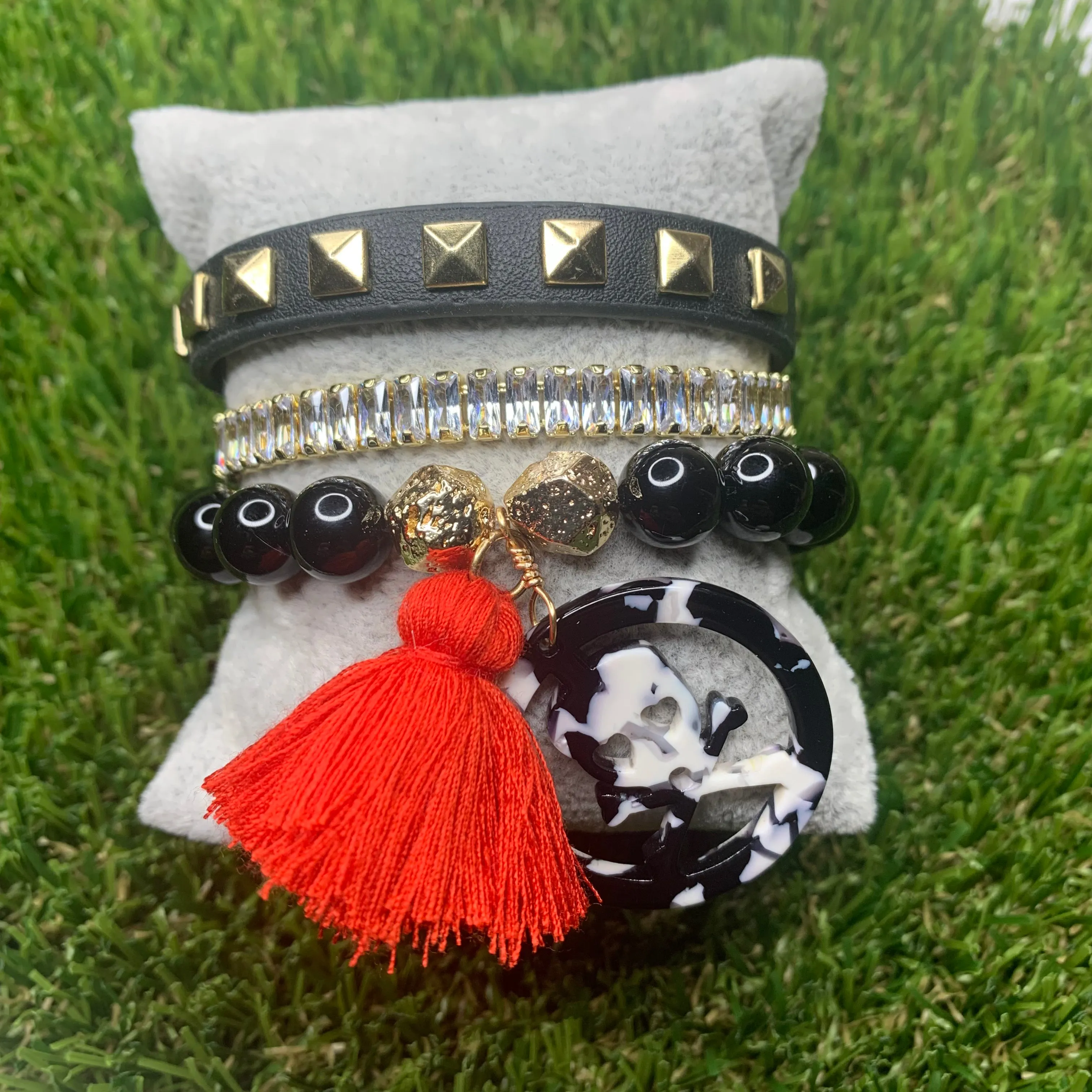 Black Agates with Acetate Skull Medallion and Red Tassel Bracelet 410-14 | Erika Williner Designs