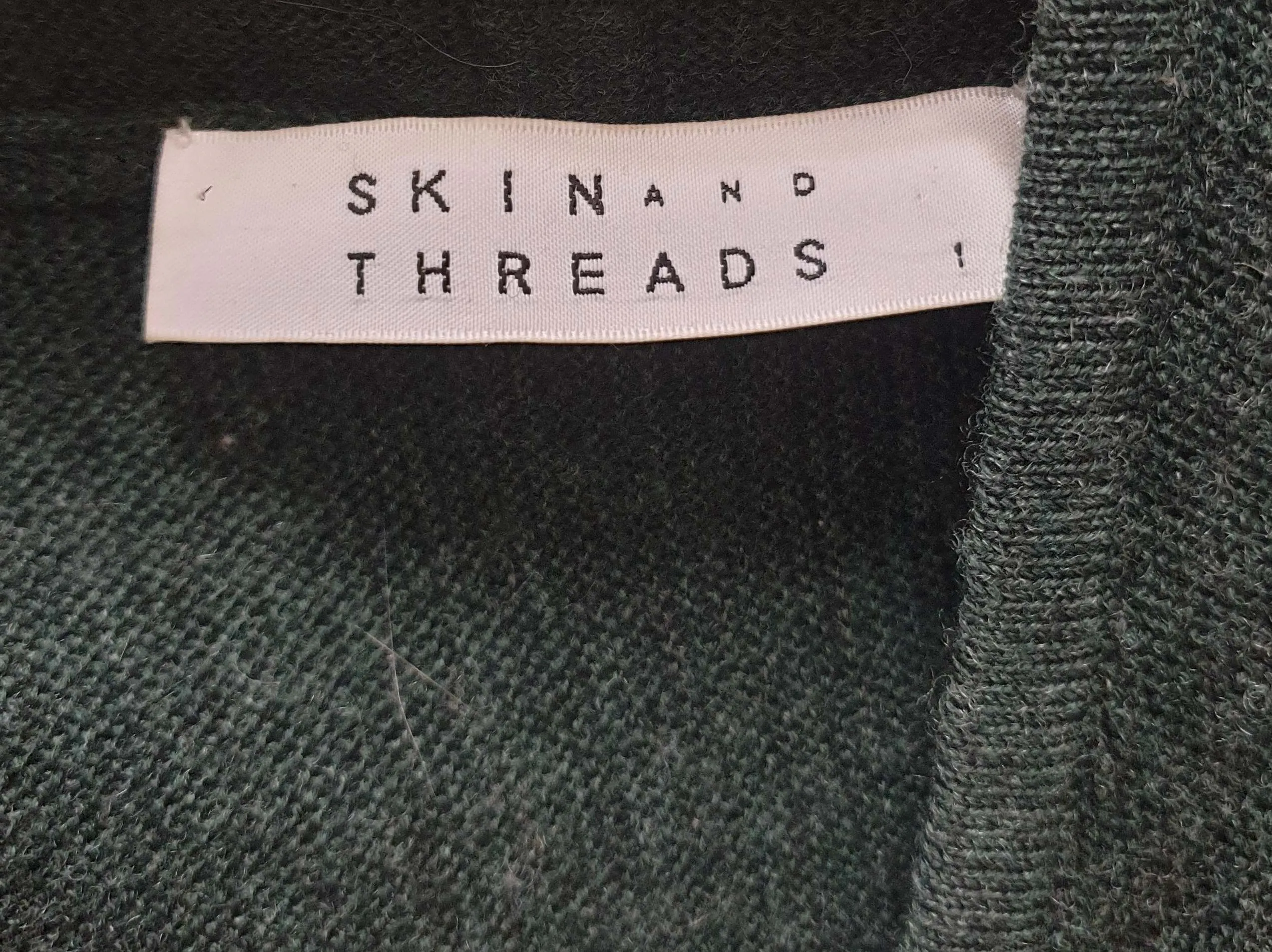 Skin & Threads green 100% extra fine merino wool cardigan size 1 (note: some pilling)