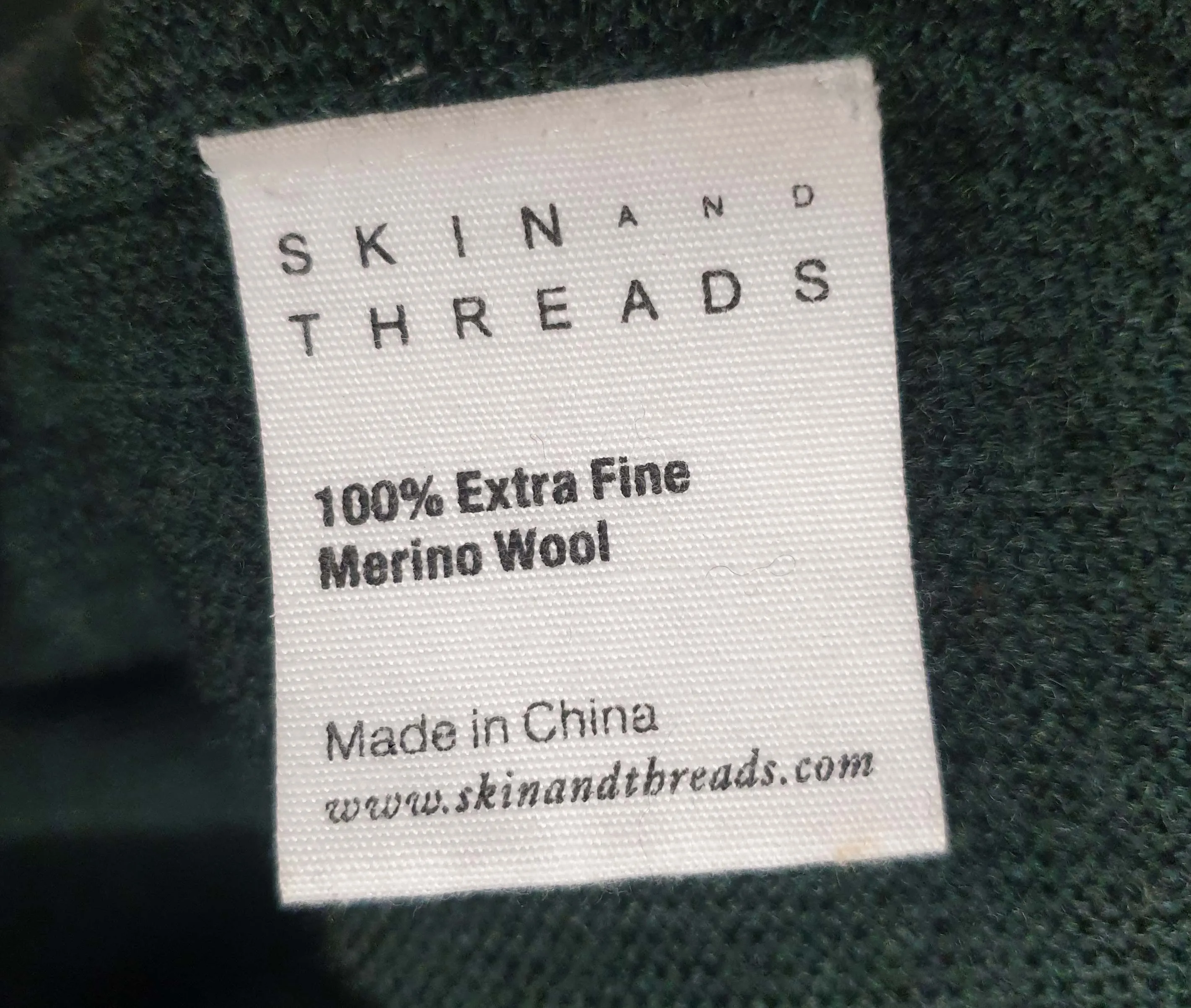 Skin & Threads green 100% extra fine merino wool cardigan size 1 (note: some pilling)