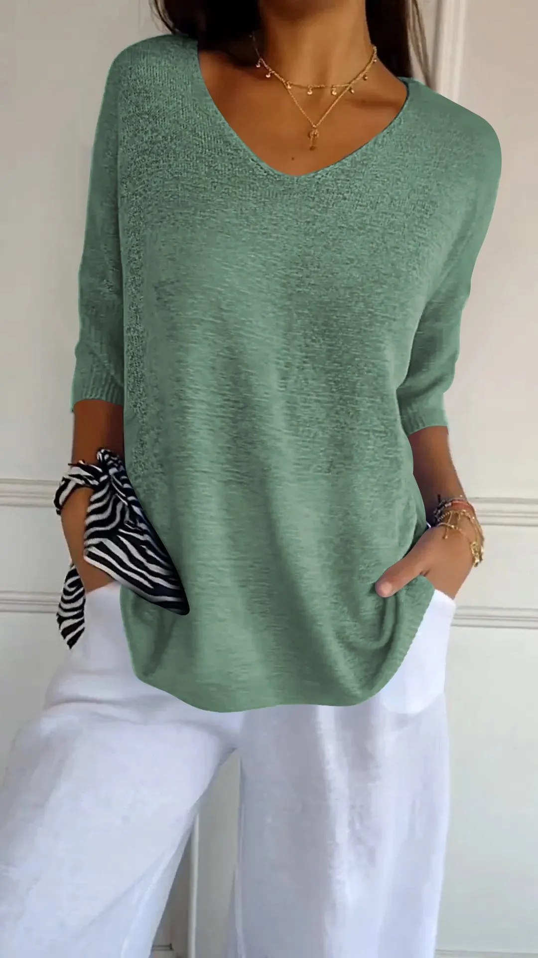 Women's blouse with v-neck and loose fit