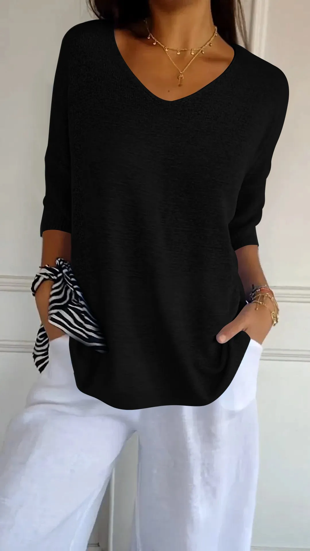 Women's blouse with v-neck and loose fit